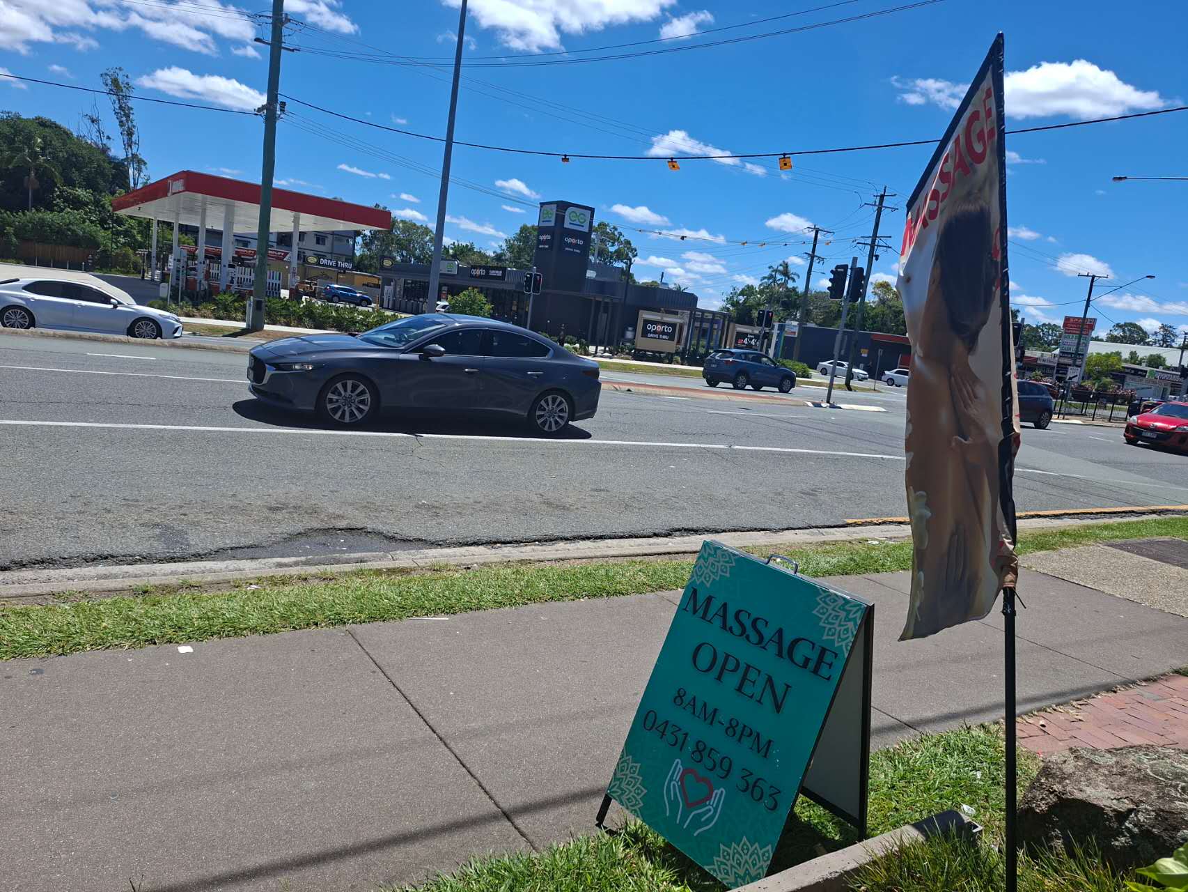 The Silk Touch sandwich board out on Morayfield Road